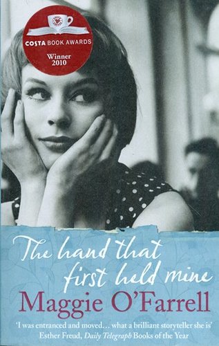 The hand that first held mine